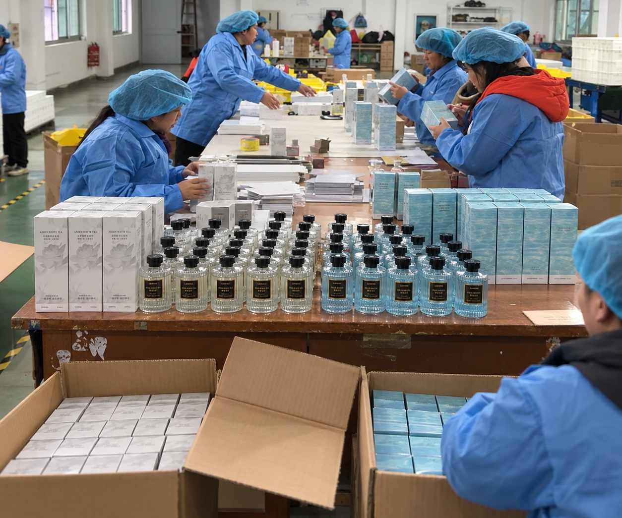 Workers packing private label reed diffusers for wholesale export at GT Industrial Cosmetic